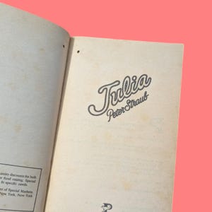 May include: A close-up of the title page of a book titled "Julia" by Peter Straub.