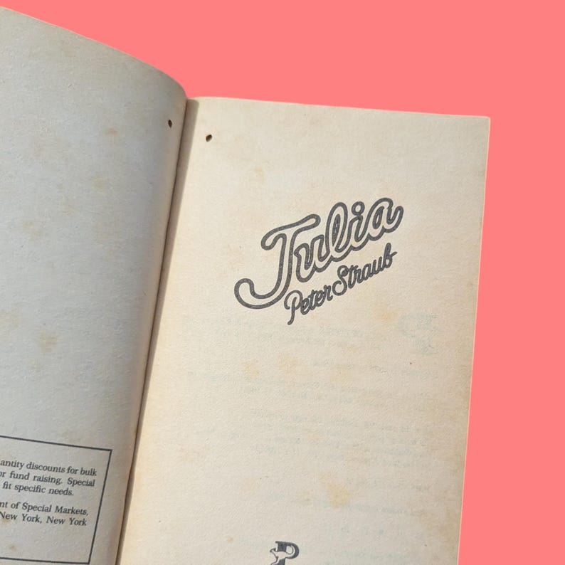 May include: A close-up of the title page of a book titled "Julia" by Peter Straub.