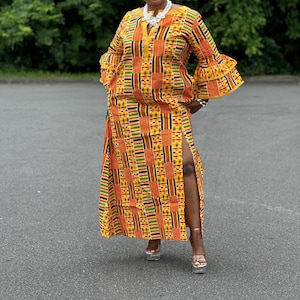 Maxikleid mit Ankara-Print, Trompetenärmeln und elegantem Seitenschlitz - afrikanisch inspirierte Mode