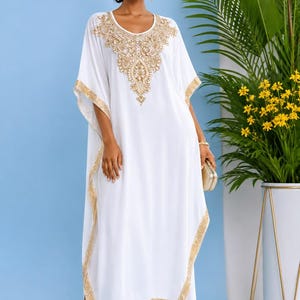 white dress with gold accents DINGZANCAMO and Applique Ball Wedding Dresses for Bride Long Sleeves 2 : Clothing, Shoes & Jewelry The intricate detailing at the bodice and hemline adds a touch of sophistication to the look Women White and Gold Dress