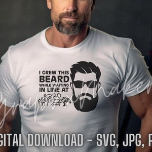May include: A white t-shirt with a black and white graphic design. The graphic features a man with a beard and sunglasses, and the text "I grew this beard while waiting in line at".