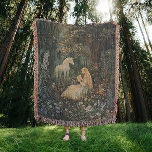 This beautifully detailed design captures a serene scene of a maiden reading among wildflowers as a gentle unicorn stands nearby, evoking a sense of wonder, peace, and imagination.