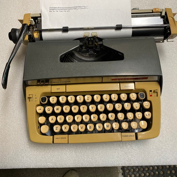Smith Corona Classic 12 portable typewriter with case.