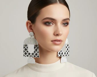 Pendientes de piel de serpiente de plata: joyas geométricas con un toque llamativo