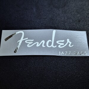 Upgrade your Fender Jazz Bass with our high quality durable waterslide headstock decal. You will be the envy of your whole band with this sticker on your bass. Show off to the audience with your authentic, EPIC WIN Jazz Bass Fender waterslide decal.