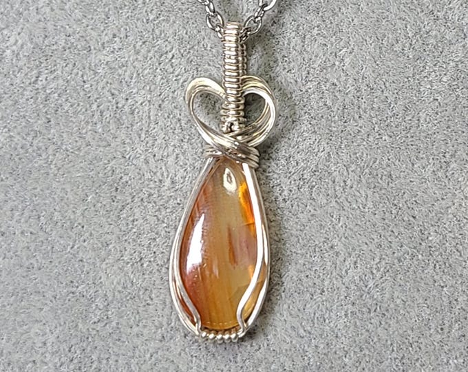 small sterling silver, carnelian necklace, wire wrapped pendant, gift for her, spiritual grounding, stimulates the root chakra, bold action.