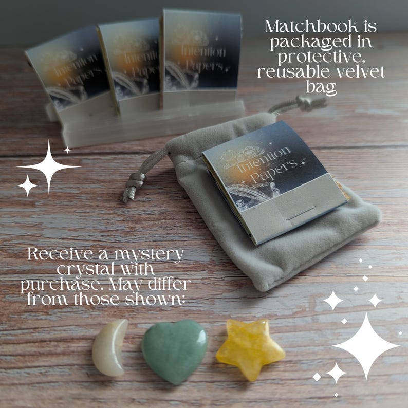 May include: An image of Intention Papers matchbooks, packaged in a reusable velvet bag, with a mystery crystal. The crystals are shaped like a moon, a heart, and a star. The text on the matchbooks reads "Intention Papers."