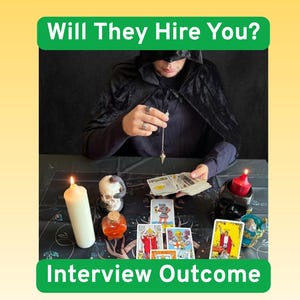 May include: A person in a black hooded cloak holds a pendulum over a spread of tarot cards. The scene includes a white candle, a red candle, a skull, and a small bottle of orange liquid. The text reads Will They Hire You? Interview Outcome.