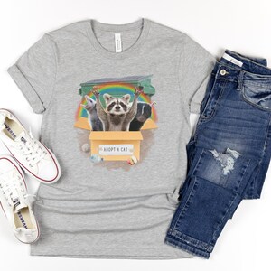 Adopt a cat raccoon, opossum, and skunk t-shirt