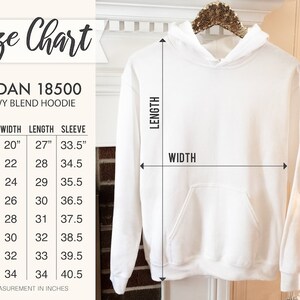 Pode incluir: Tabela de tamanhos para hoodies de mistura pesada Gildan 18500. A tabela mostra as medidas em polegadas para largura, comprimento e comprimento da manga para os tamanhos S a 5XL.