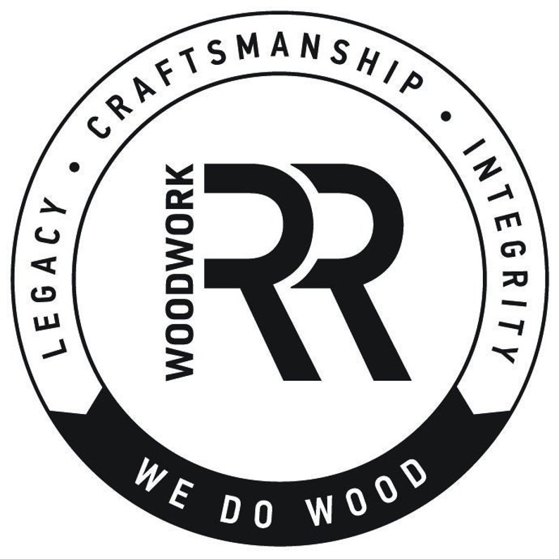 May include: A black and white circular logo with the words "LEGACY", "CRAFTSMANSHIP", and "INTEGRITY" around the perimeter. The words "WOODWORK" and "WE DO WOOD" are also present. The logo features two stylized black "R" letters.