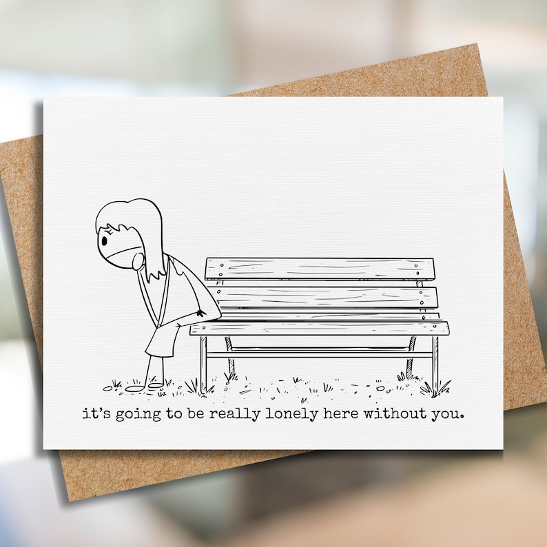 May include: A greeting card featuring a black and white illustration of a person leaning against a park bench. The text "it's going to be really lonely here without you" is printed below the illustration. The card is inside a brown envelope.