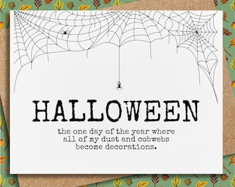 May include: A white card with black text that reads "HALLOWEEN the one day of the year where all of my dust and cobwebs become decorations."