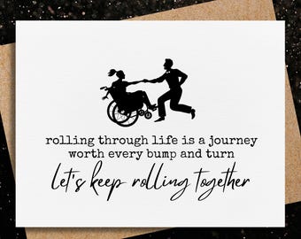 May include: Black and white silhouette of a couple dancing, the woman is in a wheelchair. The text reads "rolling through life is a journey worth every bump and turn Let's keep rolling together".
