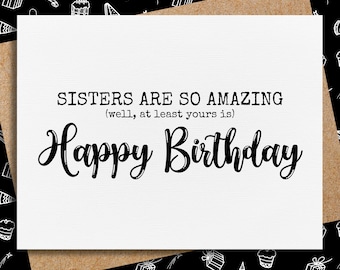 May include: A white card with black text that reads "Sisters are so amazing (well, at least yours is) Happy Birthday". The card is on a brown background with a black and white pattern of birthday-themed doodles.
