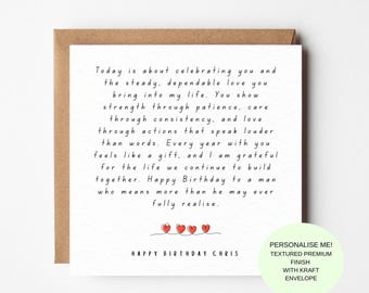 May include: A square white greeting card with black handwritten text that reads: Today is about celebrating you and the steady, dependable love you bring into my life. Happy Birthday Chris. Four small red hearts are drawn below the text.