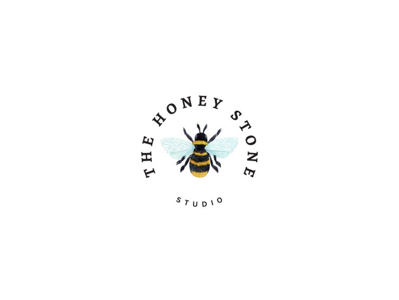 The logo for "The Honey Stone Studio" features a bee with a honeycomb pattern, surrounded by the studio's name in a circular design.
