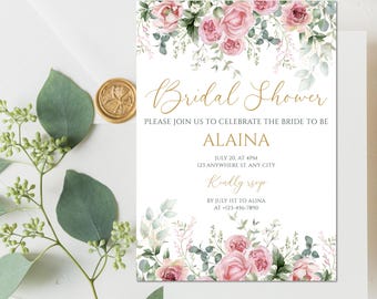 May include: A white invitation card with the text "Bridal Shower" in gold script, adorned with pink roses and greenery. The invitation includes details for Alaina's bridal shower, with a gold wax seal and eucalyptus sprig in the background.