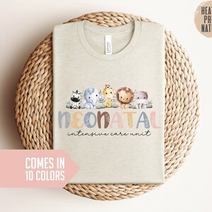May include: A heather prism natural t-shirt with a design of cute animals and the text "Neonatal Intensive Care Unit". The shirt comes in 10 colors.