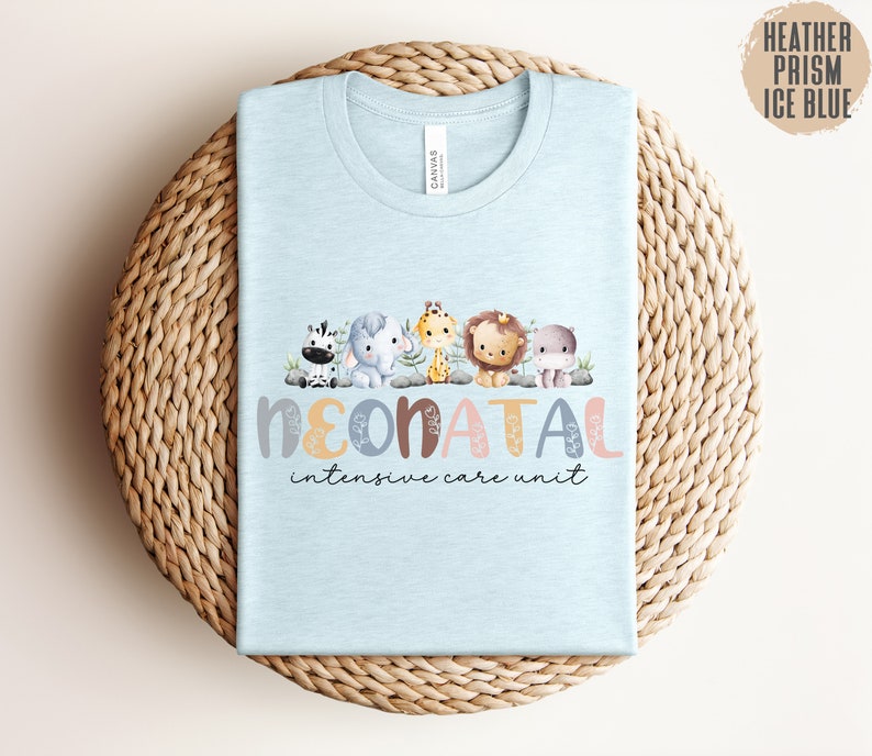 May include: Light blue t-shirt with a graphic of a line of cute animals and the text "NEONATAL intensive care unit".