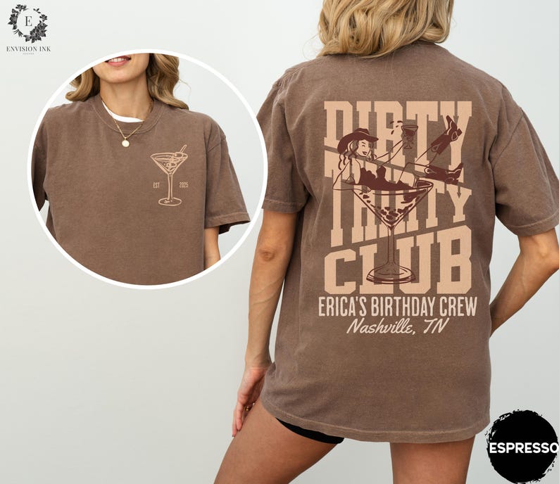 May include: Brown t-shirt with a graphic of a woman in a cowboy hat holding a martini glass with the text "Dirty Thirty Club" and "Erica's Birthday Crew Nashville, TN".
