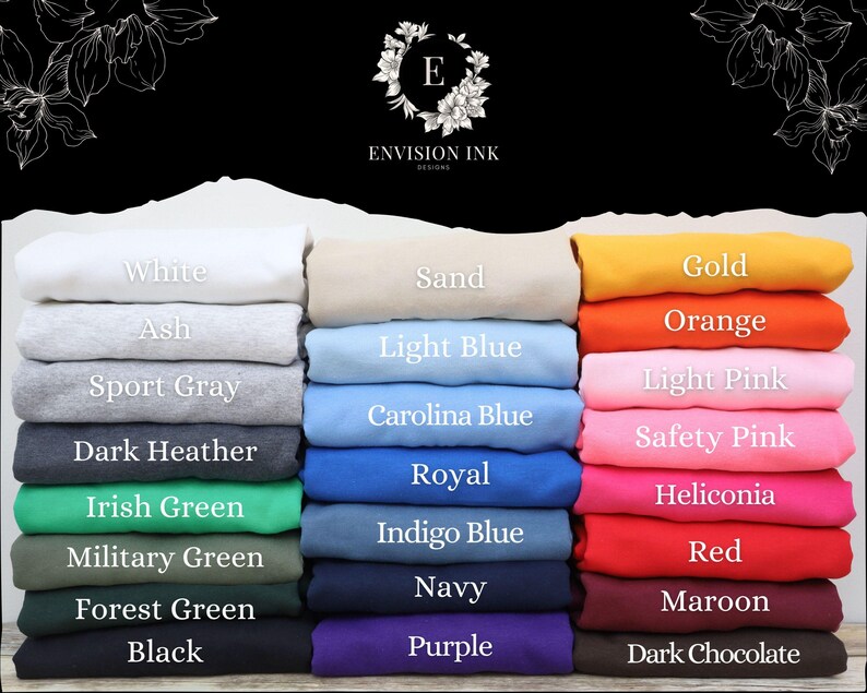 May include: A color chart of 18 different t-shirt colors, including white, ash, sport gray, dark heather, Irish green, military green, forest green, black, sand, light blue, Carolina blue, royal, indigo blue, navy, purple, gold, orange, light pink, safety pink, heliconia, red, maroon, and dark chocolate.