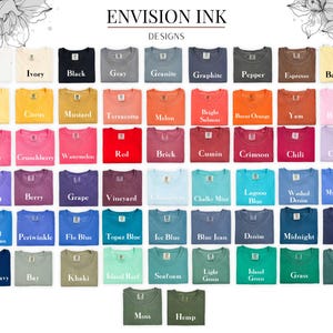 May include: A chart of 48 different color names for t-shirts. The colors are arranged in rows and columns, with the names of the colors printed in white below each swatch.