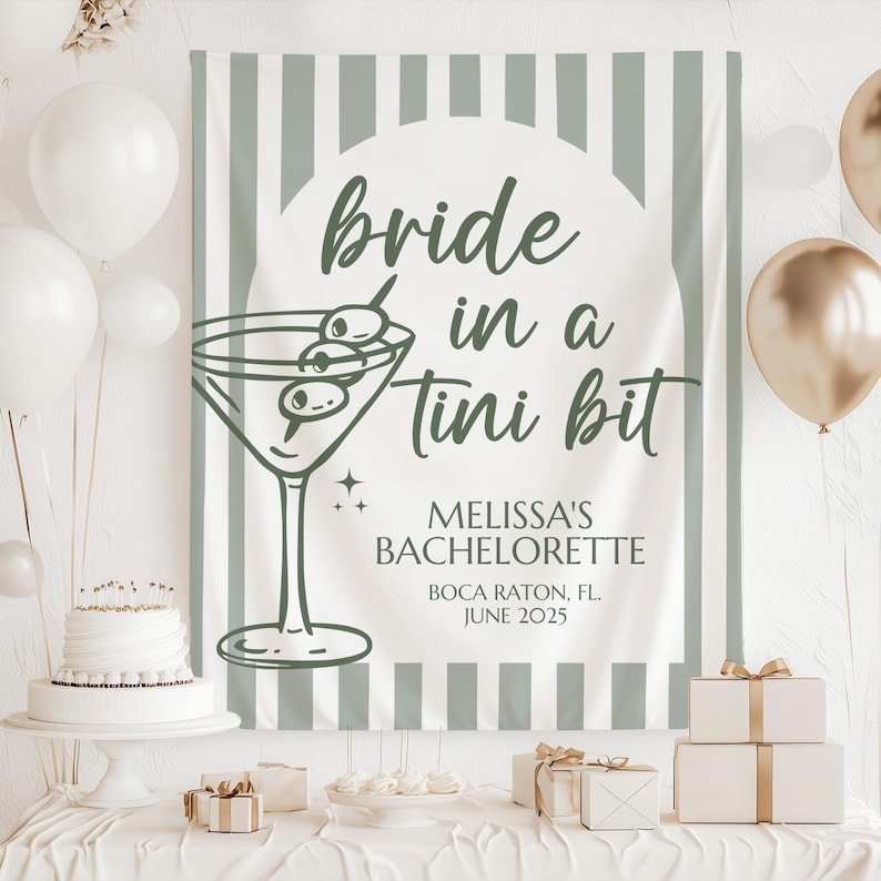 May include: A white and green striped backdrop with the text "bride in a tini bit" and a martini glass with olives. The text below the martini glass reads "Melissa's Bachelorette Boca Raton, FL. June 2025".