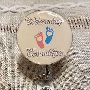 Willkommens Komitee Abzeichen Reel: Baby Füße, Arbeit & Lieferung Krankenschwester