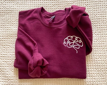 Sudadera de cuello redondo con bordado de cerebro: Regalo de neurología