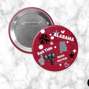 May include: A red button with a silver back and pin. The front of the button features the word "ALABAMA" and the phrase "Roll Tide" with a gray elephant graphic, a state outline, and other decorative elements.