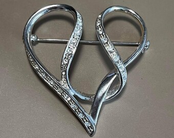 Lapel pin, silver plated with cut crystals looped heart brooch