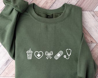 Nurse Icons Sweatshirt, Nurse-Assistant-Doctor Shirt, Hospital Crew Style Sweatshirt, Nurse Gift, Medical Professional Sweater,New Nurse Tee