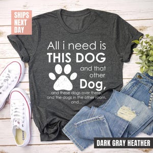 Dog lovers unite! This cozy dark gray heather tee is a must-have for every pup parent.