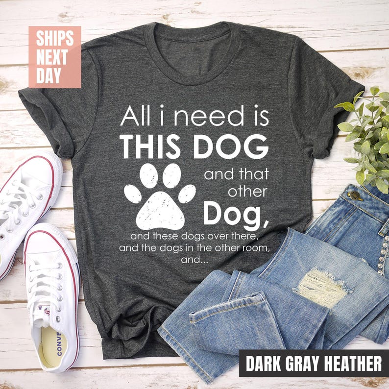 Dog lovers unite! This cozy dark gray heather tee is a must-have for every pup parent.