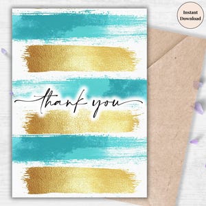 May include: A white card with a gold and turquoise watercolour design. The card says "thank you" in black script.