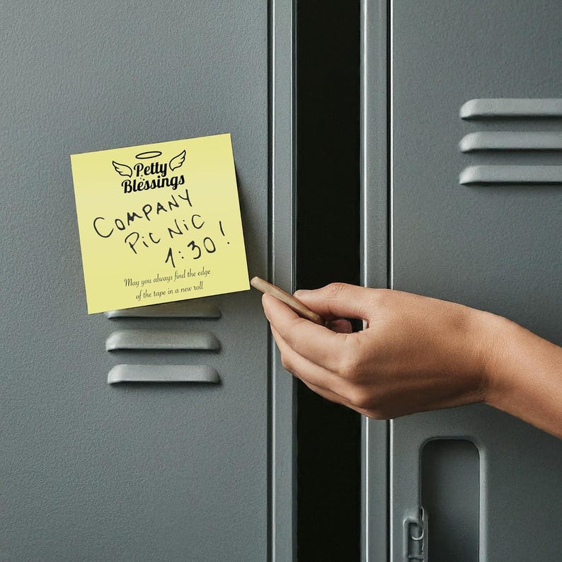 May include: A yellow sticky note on a gray locker door with the text "Petty Blessings Company Pic Nic 1:30! May you always find the edge of the tape in a new roll."
