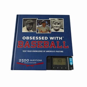 May include: A blue book titled "Obsessed With Baseball" featuring baseball player images. The cover text reads "Test Your Knowledge of America's Pastime" and "2500 Questions". A black electronic game is attached to the book.