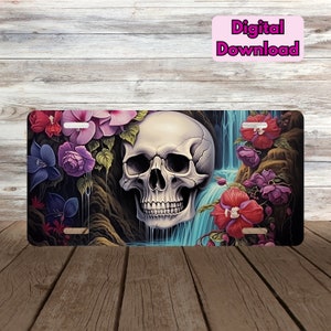 May include: A digital download of a license plate design featuring a white skull with a blue waterfall and pink, purple, and red flowers.