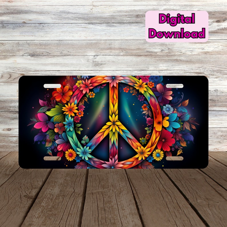 May include: A colorful peace sign surrounded by a wreath of vibrant flowers on a black background. This design is perfect for a license plate.