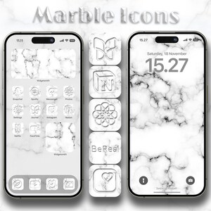 Op de afbeelding: Een witte marmeren telefoonachtergrond met een set witte marmeren app-pictogrammen. De app-pictogrammen omvatten een vlinder, een doos met de letter N, een bloem, de woorden "BeReal" en een hart. Het telefoonscherm toont ook de datum en tijd, "Zaterdag 18 november 15.27".