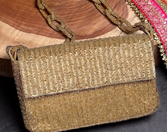 Gold Faux Silk Fold Over Clutch For Styling in Wedding Functions or Ethnic Party, Embellished With Striped Embroidered