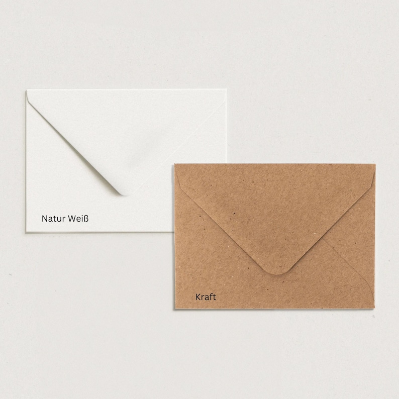 May include: Two envelopes, one white with the text "Natur Wei&szlig;" and one brown with the text "Kraft".