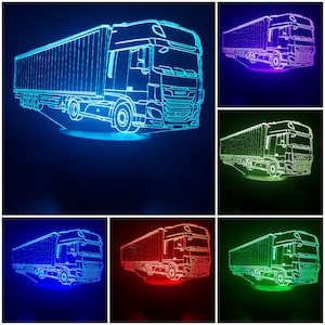 May include: A 3D printed acrylic night light depicting a semi-trailer truck. The truck is outlined in white and is illuminated in blue, red, green, and purple. The night light is a great gift for truck drivers or anyone who loves trucks.