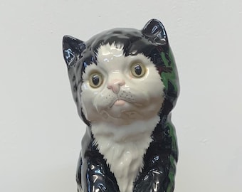 Vintage tuxedo cat ornament in black and white gloss with green glass eyes
