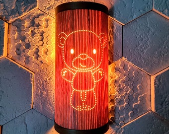 Handmade wooden night lamp with the image of a Teddy bear