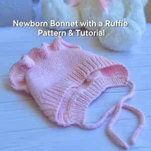 May include: A light pink knitted newborn bonnet with a ruffle pattern. The bonnet has a textured appearance and ties. The text "Newborn Bonnet with a Ruffle Pattern & Tutorial" is displayed in white.