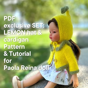 May include: A doll dressed in a handmade yellow knitted lemon-themed hat and cardigan set. The hat has a leaf detail, and the cardigan features green trim and a button closure. The image text reads "PDF exclusive SET: LEMON hat & cardigan Pattern & Tutorial for Paola Reina doll."