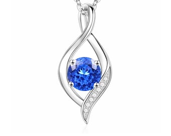 Dark Blue Spinel Pendant Necklace: Sterling Silver & CZ Accent