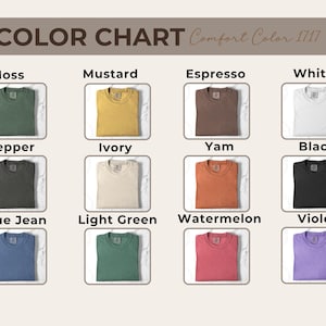 Pu&ograve; includere: Tabella colori con t-shirt Comfort Color 1717 in varie tonalit&agrave;. La tabella mostra magliette in tonalit&agrave; come muschio, senape, espresso, bianco, pepe, avorio, igname, nero, blu jeans, verde chiaro, anguria e viola.